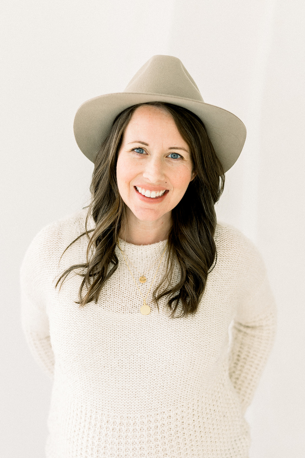 Photo of Shanna Skidmore, founder of The Blueprint Model, in cream sweater.