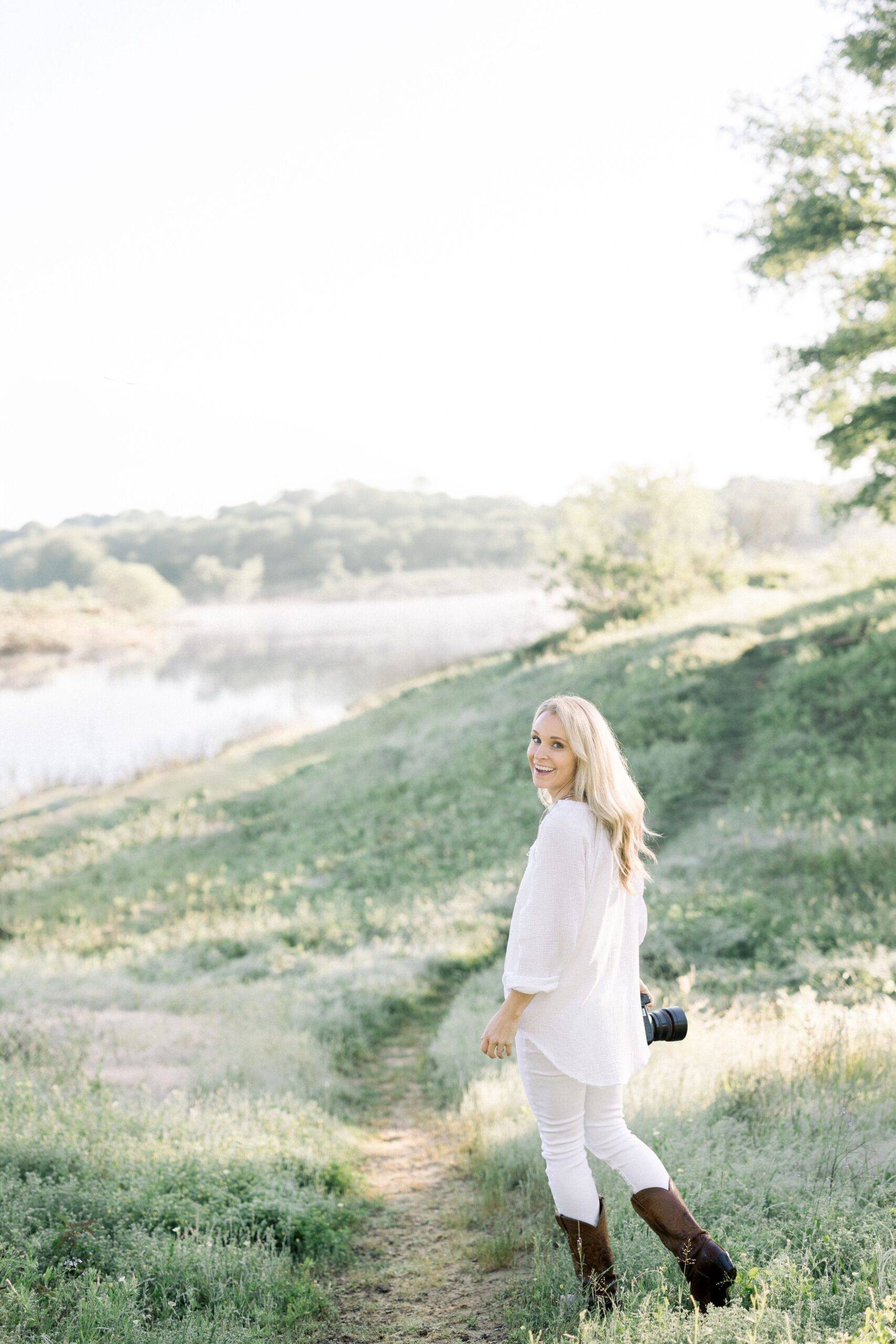 Photo of Katie Lamb (Photographer and Educator) holding camera