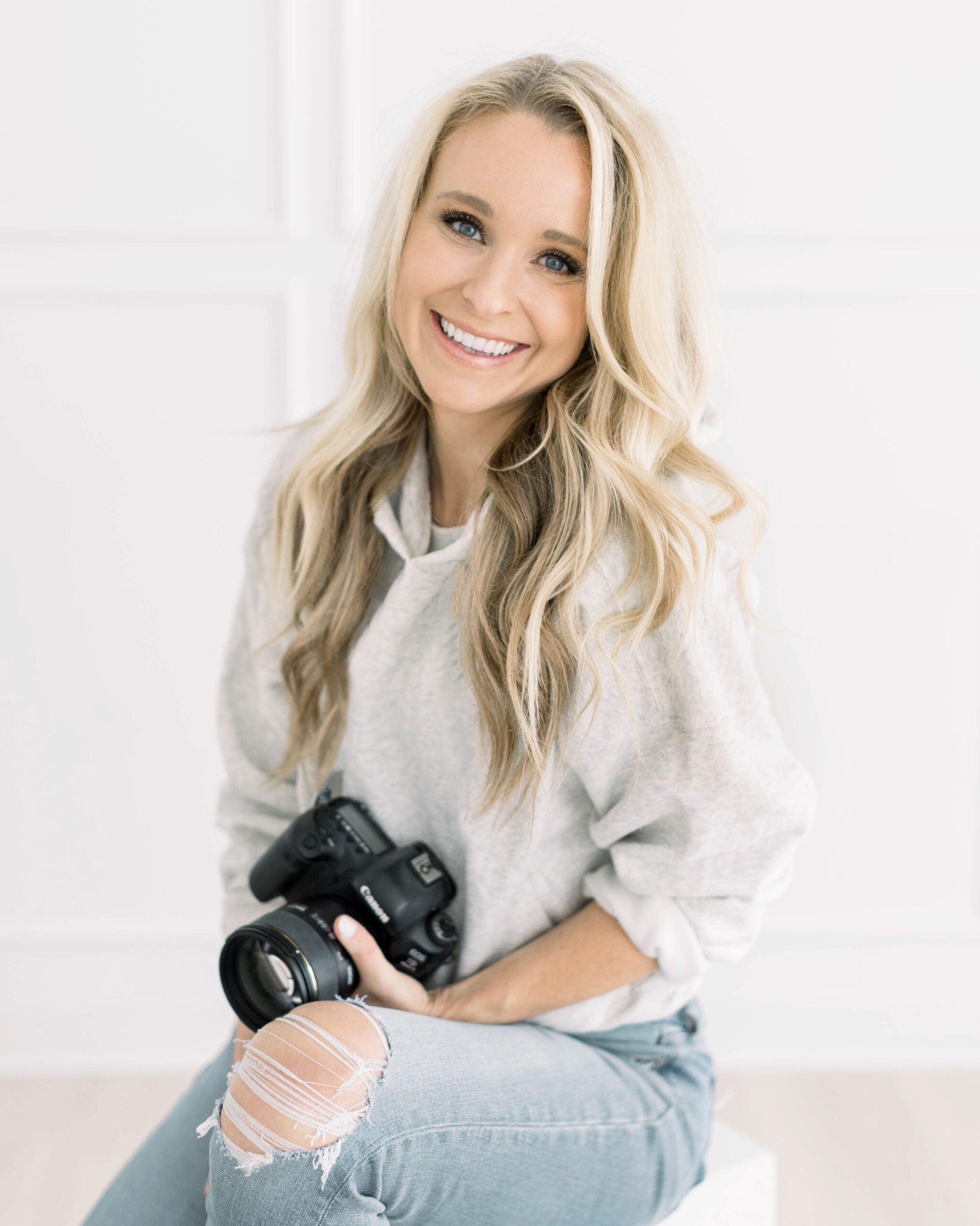 Photo of Katie Lamb (Photographer and Educator) holding camera